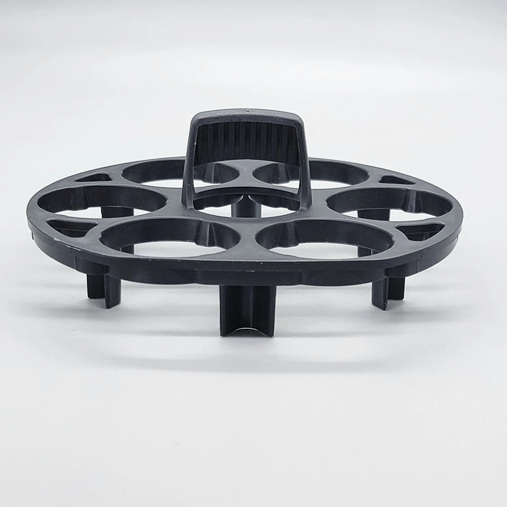 Black plastic egg holder cooking basket rack with modern design on a white background.