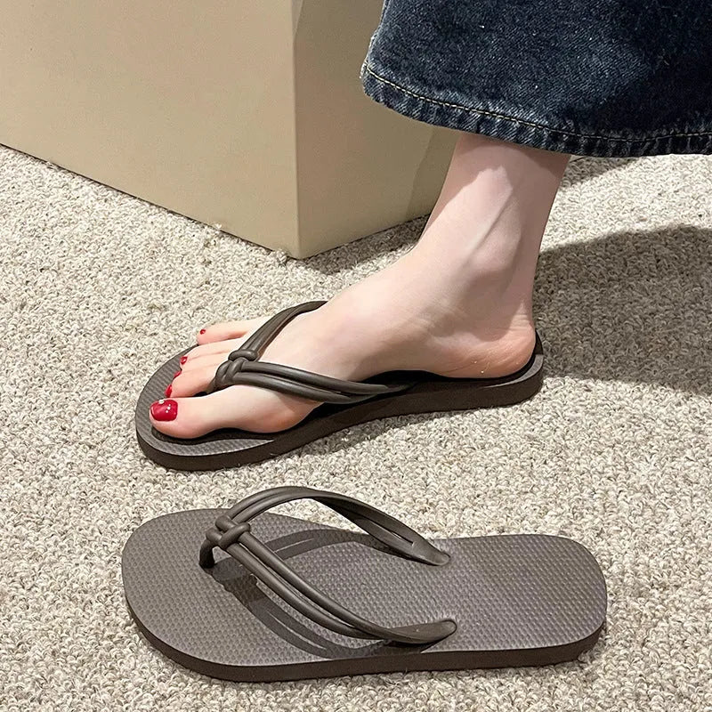 Men's PVC flip flops with toe covering design in various colours on white background