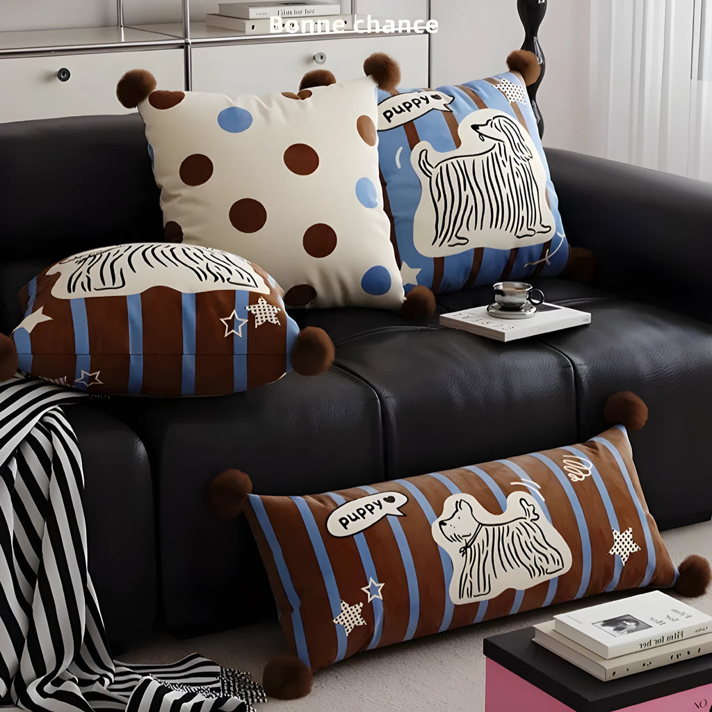 Cartoon animal print decorative cushion pillow on a sofa in blue, brown, or white.