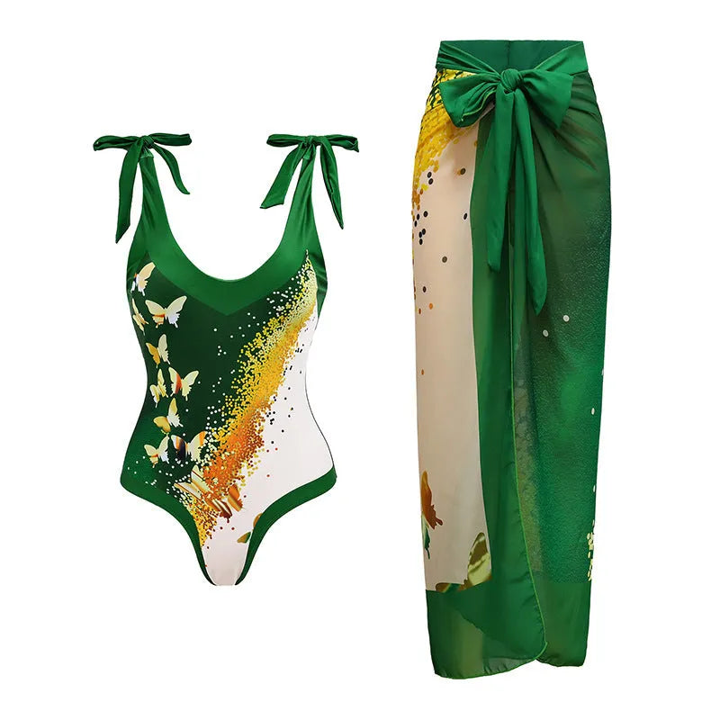 Solid colour women's one-piece swimsuit with spaghetti straps and an attached skirt.