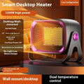 Compact desktop ceramic heater in grey colour with push-button controls