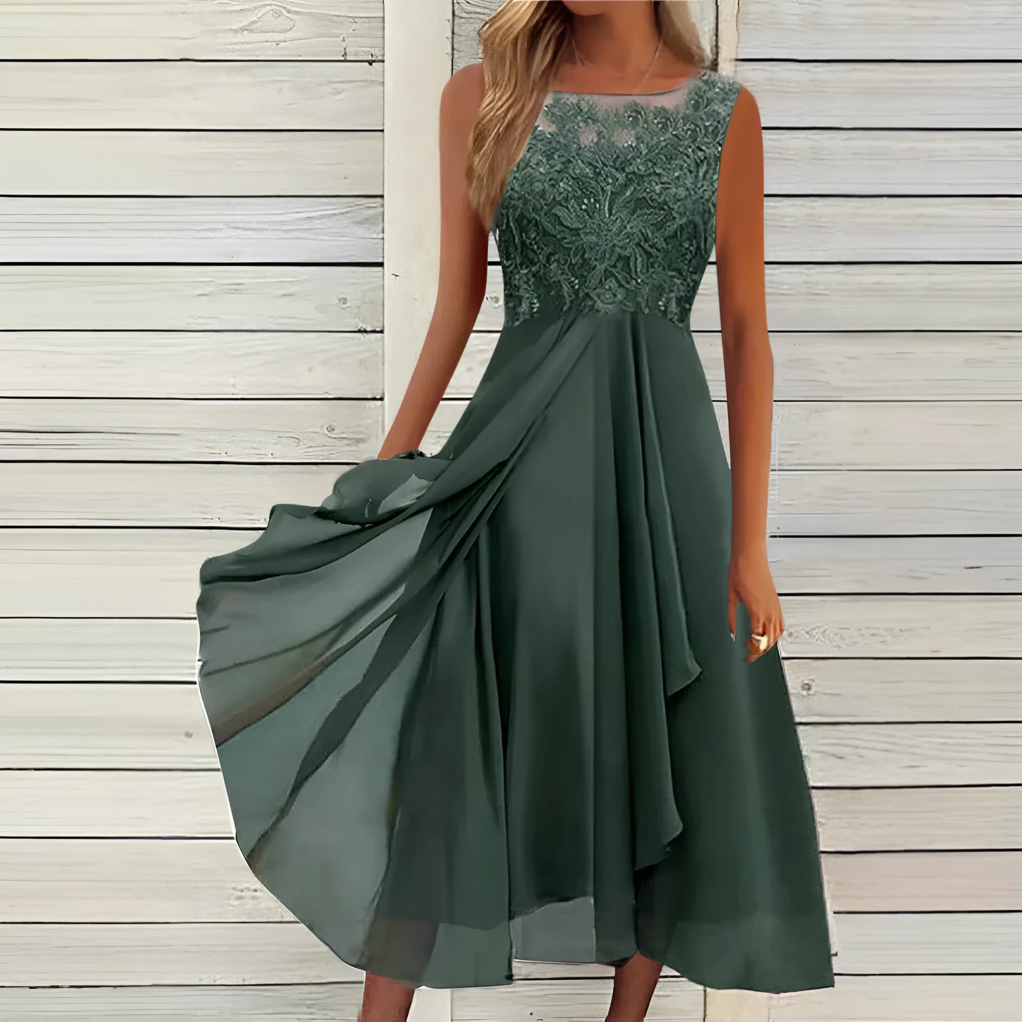 Women's sleeveless green chiffon dress with lace hollow-out detailing and mid-length princess skirt