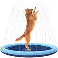 Blue circular dog splash pad on grass, 150 cm diameter, with water sprinkling from its surface.