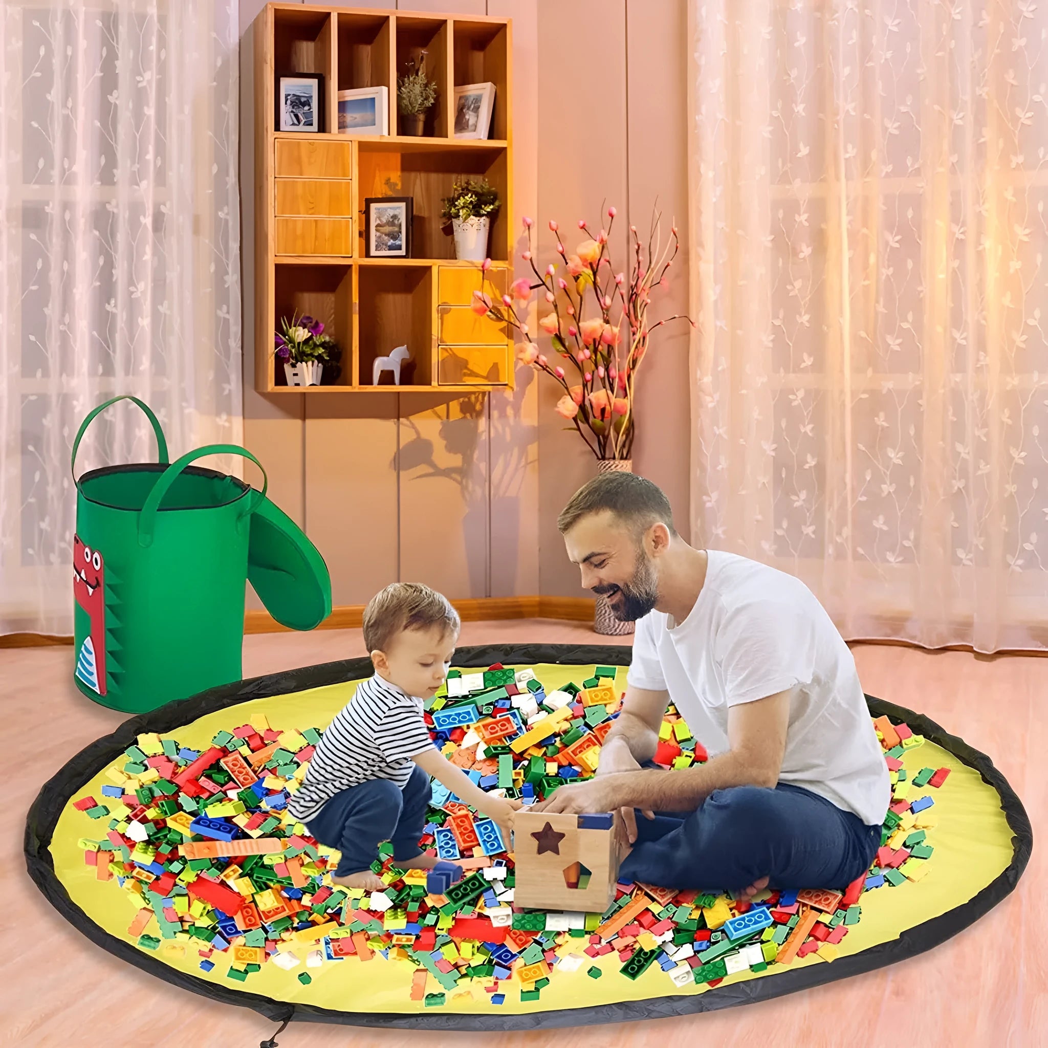 Green felt cube storage bag with pull rope serving as toy organiser and play mat