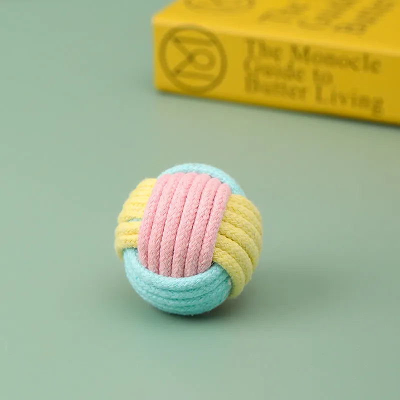 Handmade 5cm plush cotton ball cat toy in multiple colours for teeth grinding and interactive play