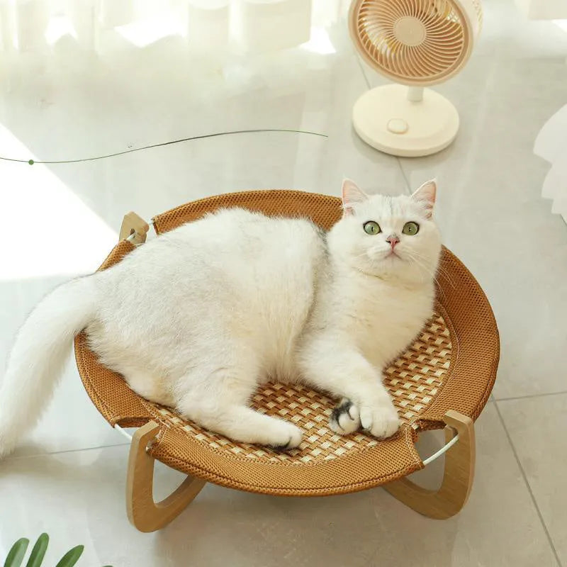 Brown woven rattan pet hammock bed measuring 46cm square raised off the ground