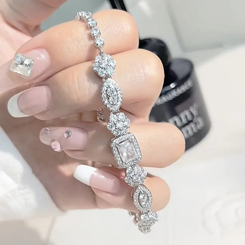 Women's geometric silver-plated bracelet with zircon stones showing adjustable and fixed length options