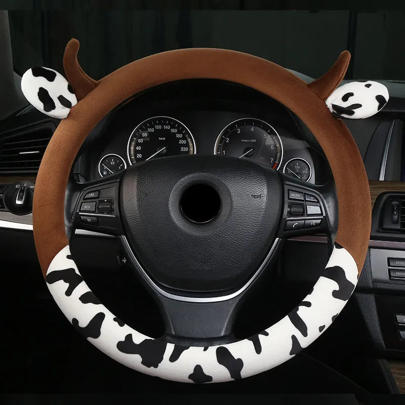 Short plush steering wheel cover with protective handle in black colour
