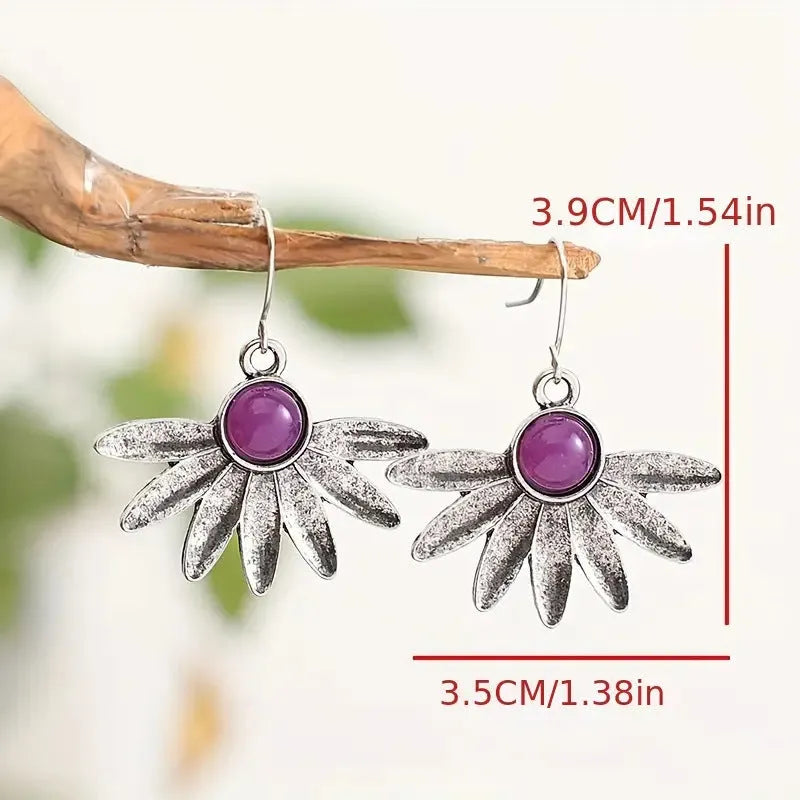 Purple resin gemstone bohemian earrings with floral design and animal zodiac elements on alloy metal