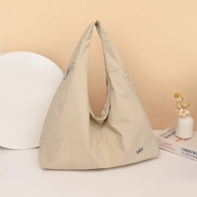 Heart-shaped nylon underarm bag with detachable shoulder strap in four colour options