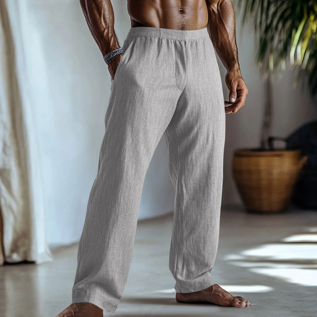 Straight-leg casual trousers in cotton and linen fabric, shown in a light green colour with visible side pockets.