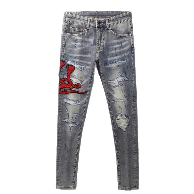 Mens old colour distressed patchwork skinny jeans with embroidery on a micro-elasticity cotton fabric.