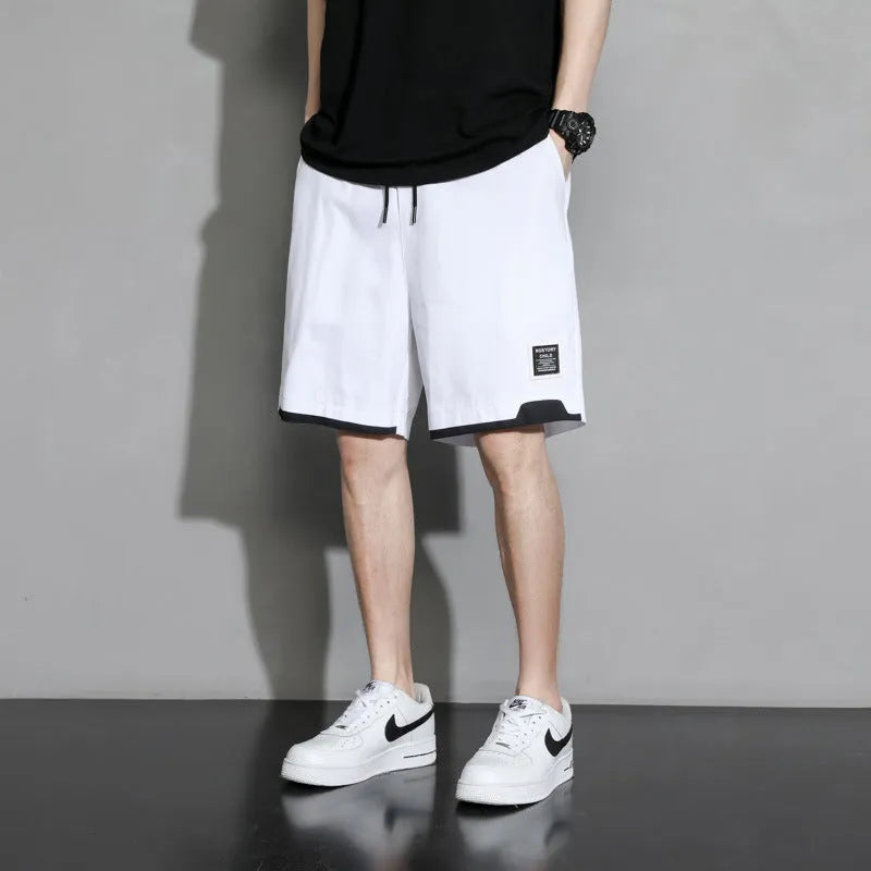 Cotton shorts for boys in black, khaki or white colours with mid waist design and extended sizing options