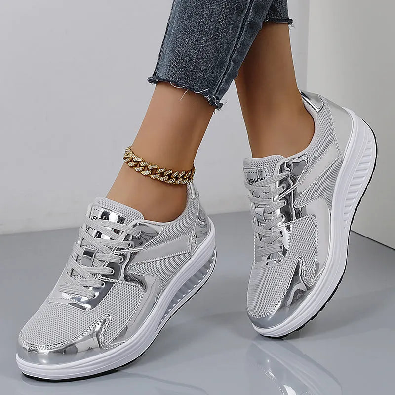 Women's mesh platform shoes with cross strap design in gold colour with waterproof base