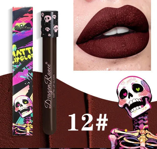 Halloween creative makeup lip gloss in skull-shaped test tube packaging, showing a matte gold and silver finish.