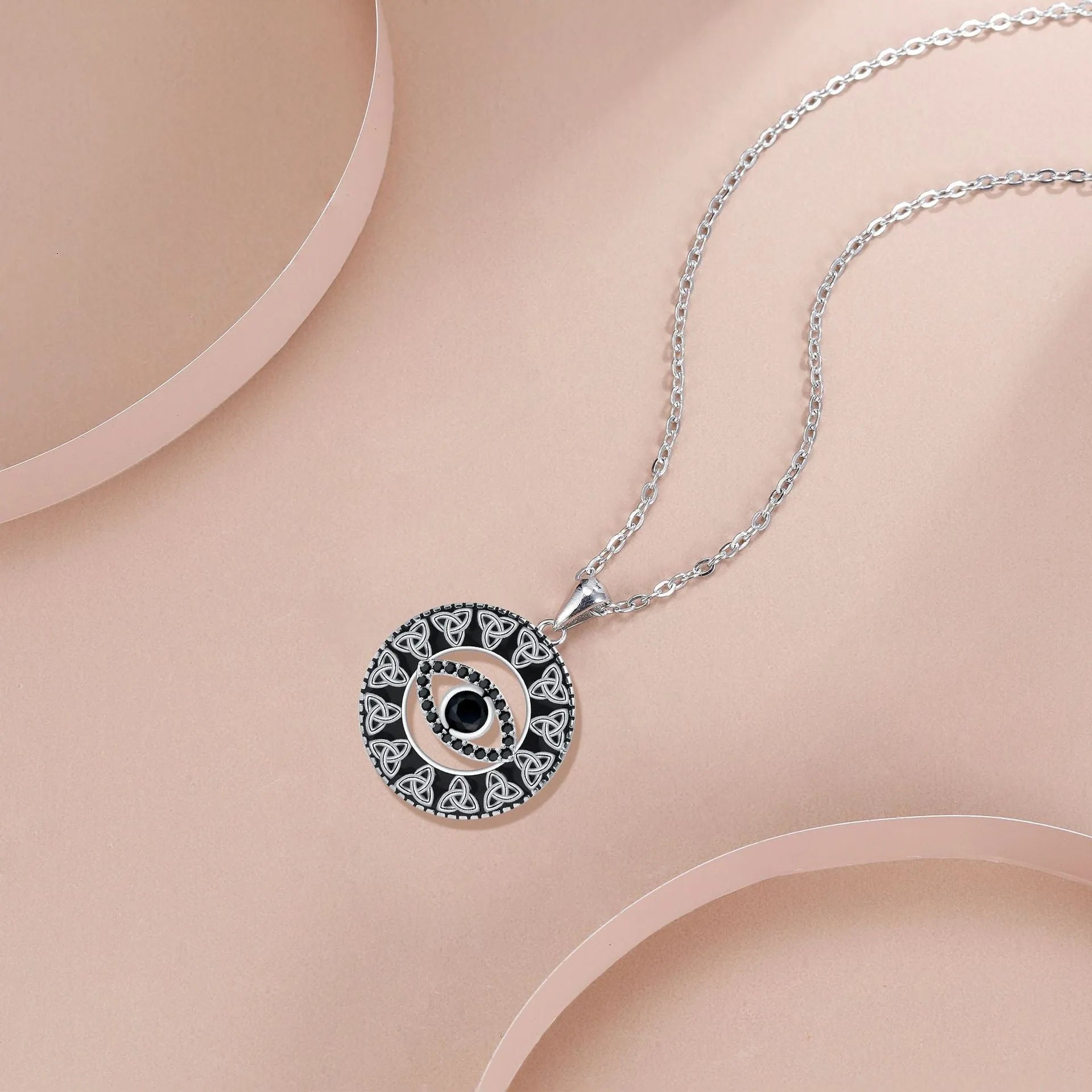 Copper electroplated Devil's Eye pendant necklace with a detailed cross chain for women.