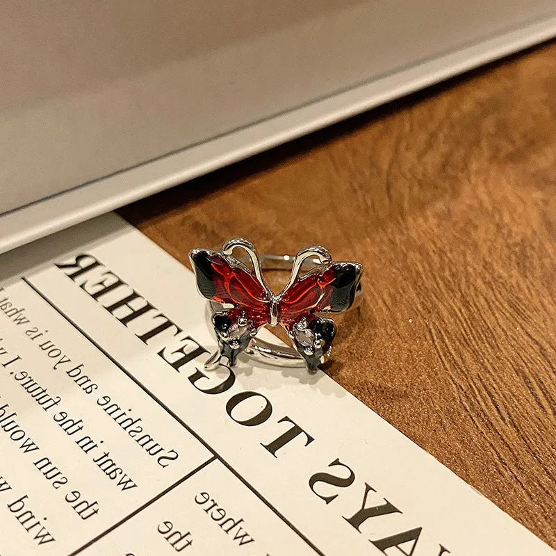 Creative Chinese butterfly women's copper ring with dripping oil treatment process in simple style.