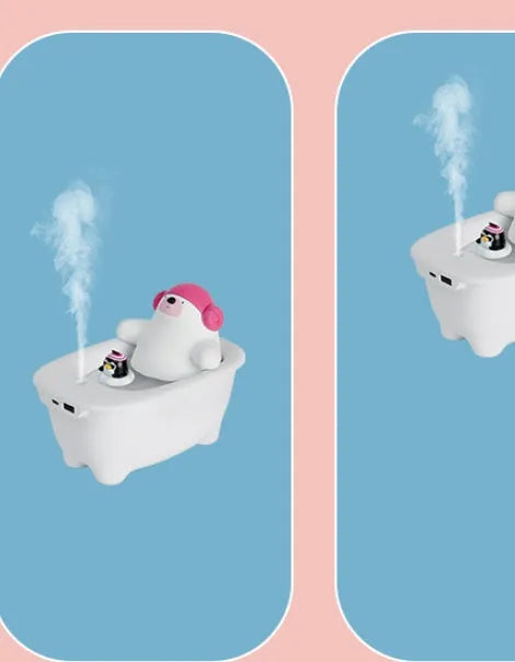 White polar bear-shaped USB air humidifier with water tank on a desk.