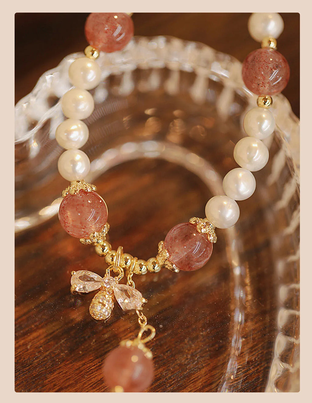 Crystal bracelet with strawberry quartz stringed pearls and bow detail for female summer wear