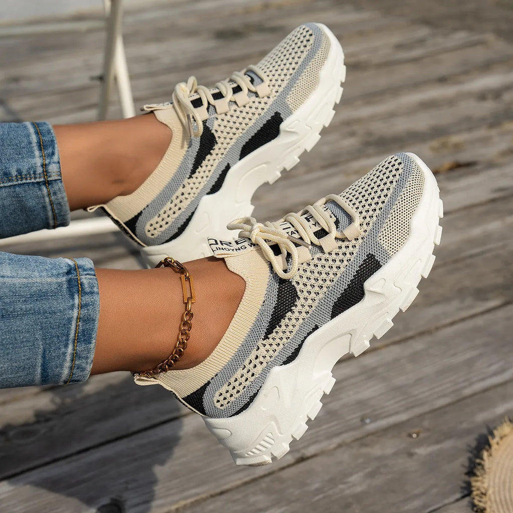 Women's Flyknit mesh lace-up sneakers in multiple colour options with rubber sole