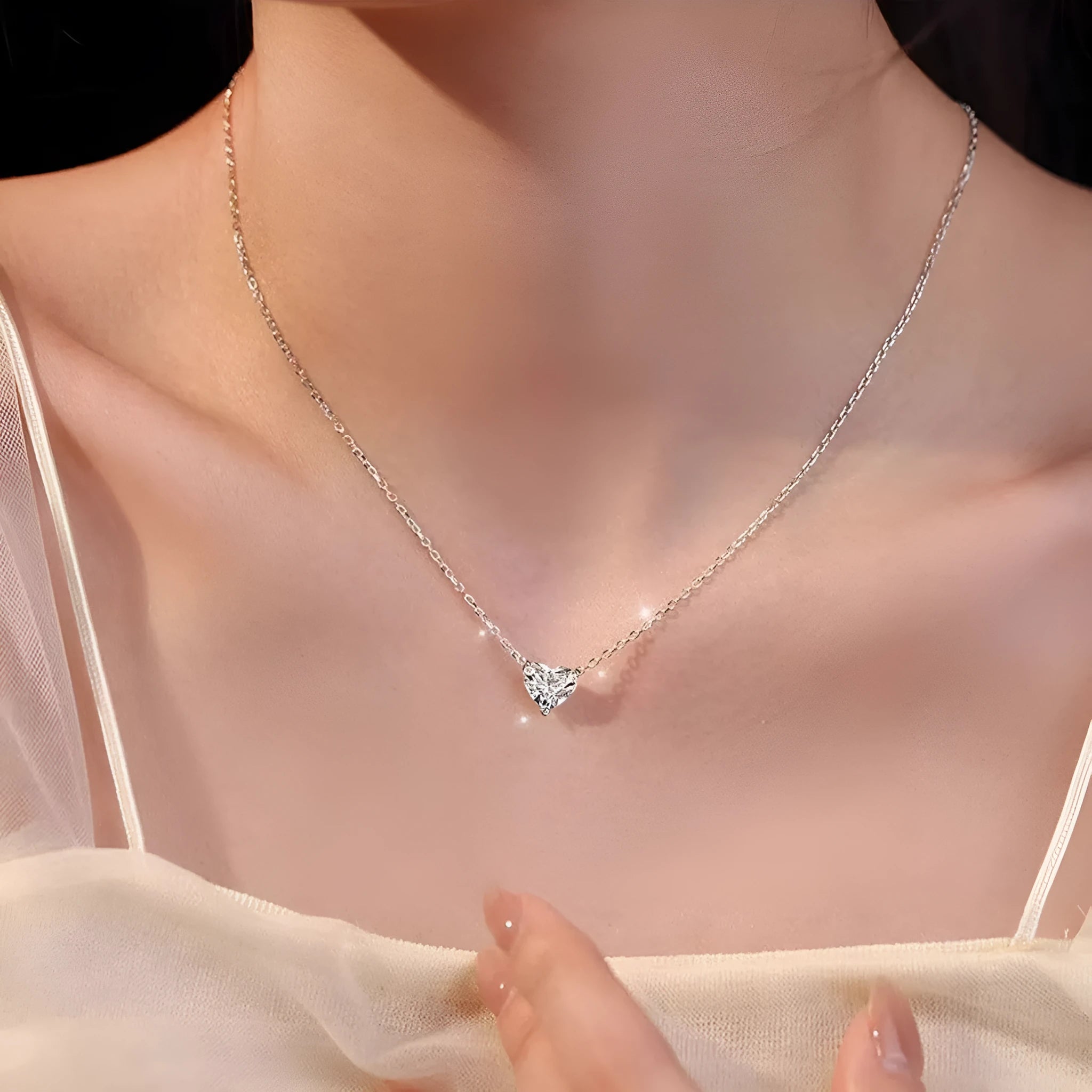 Women's silver heart necklace with copper construction and simple design