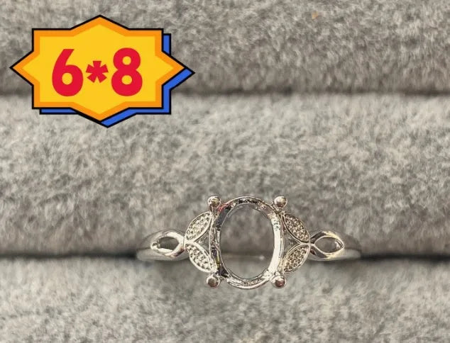 Korean style oval denier ring ornament with 6x8mm stone and star detail on electroplated copper.