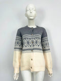 Women's red alpaca wool diamond knit cardigan with contrast colour long sleeves
