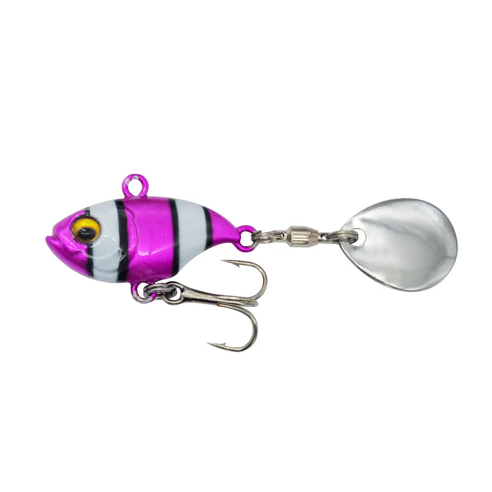 Metal sea fishing lure with rotating sequins in gold colour pattern