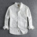 Men's solid colour cotton long sleeve cardigan shirt in light blue on hanger