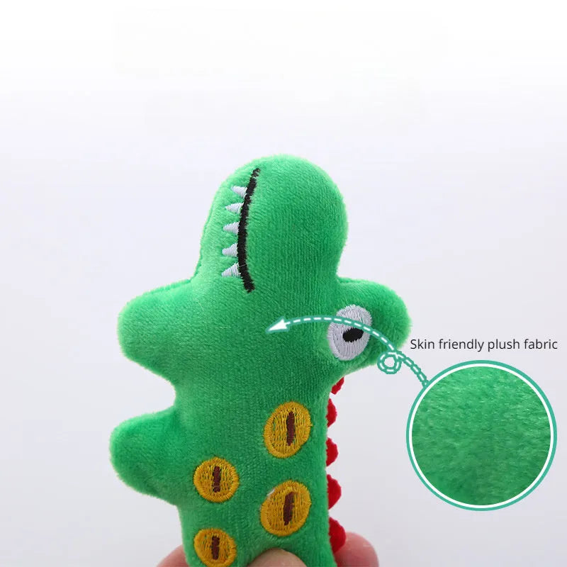 Soft plush cat toy shaped like a cow or parrot, filled with catnip, on a neutral background.