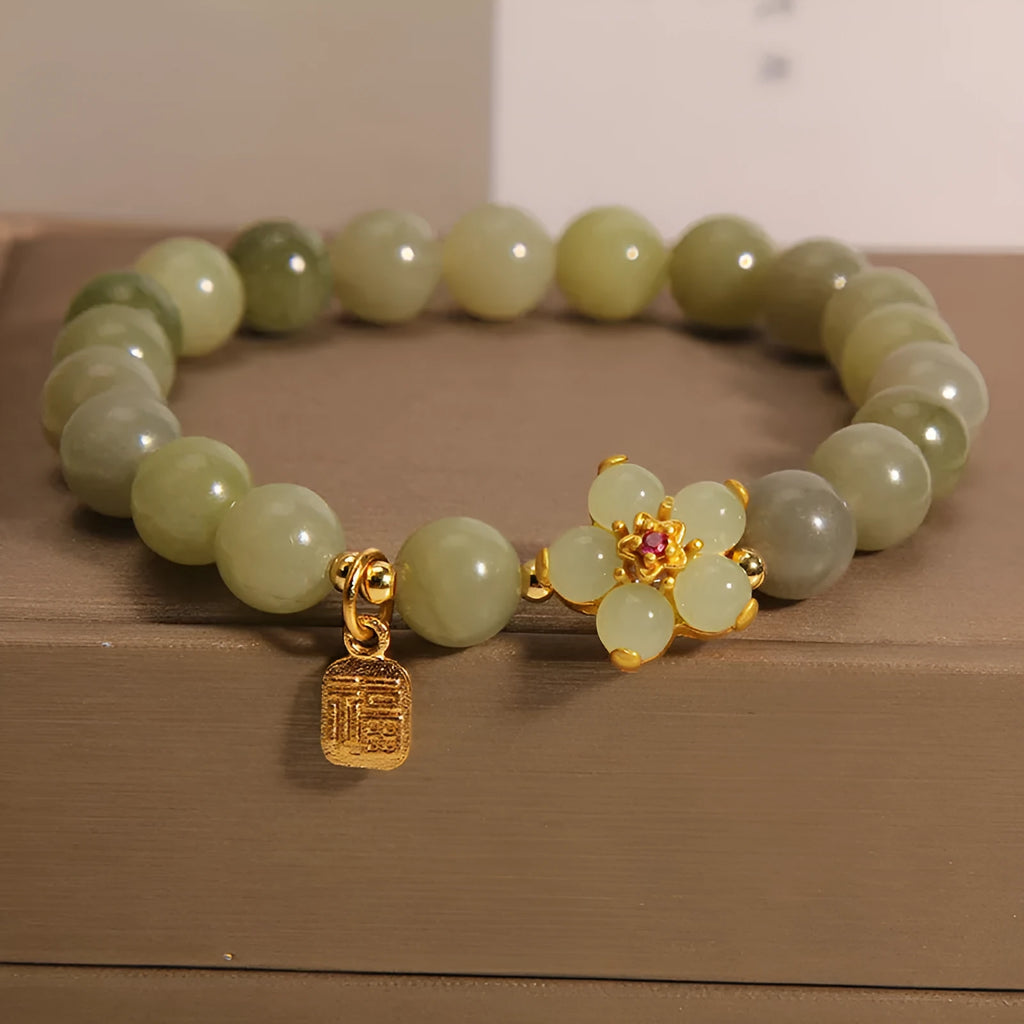 A women's casual alloy bracelet with a grey jade colour finish and a clasp.