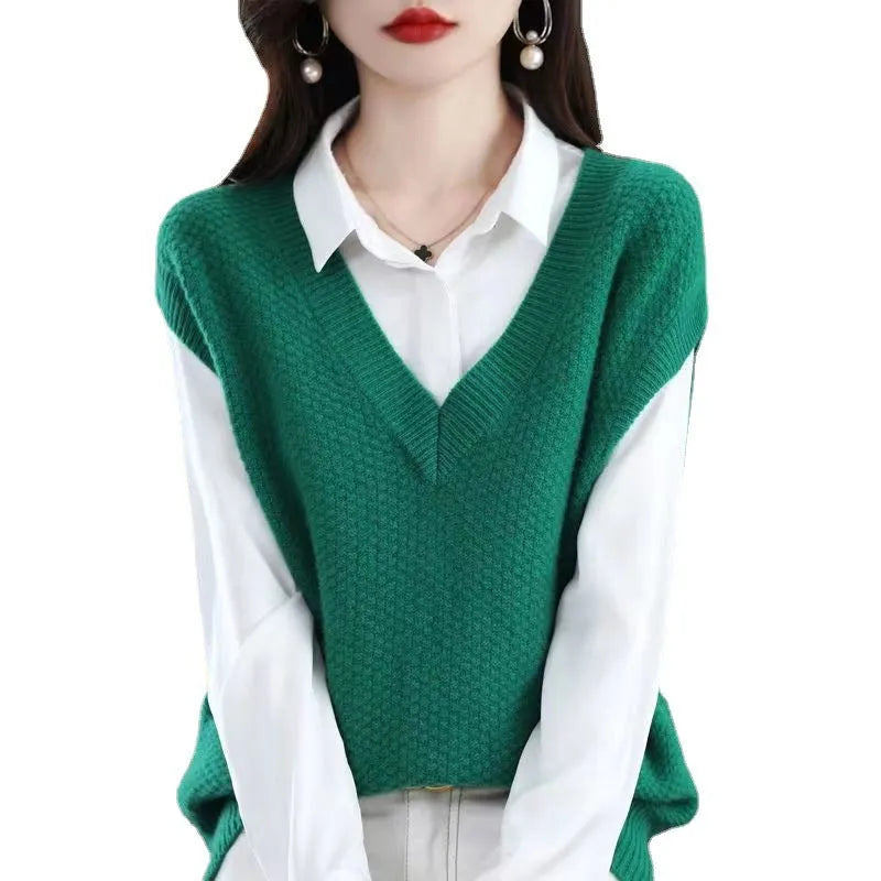 Sleeveless pullover vest with 3D knit pattern in creamy-white colour, shown on hanger