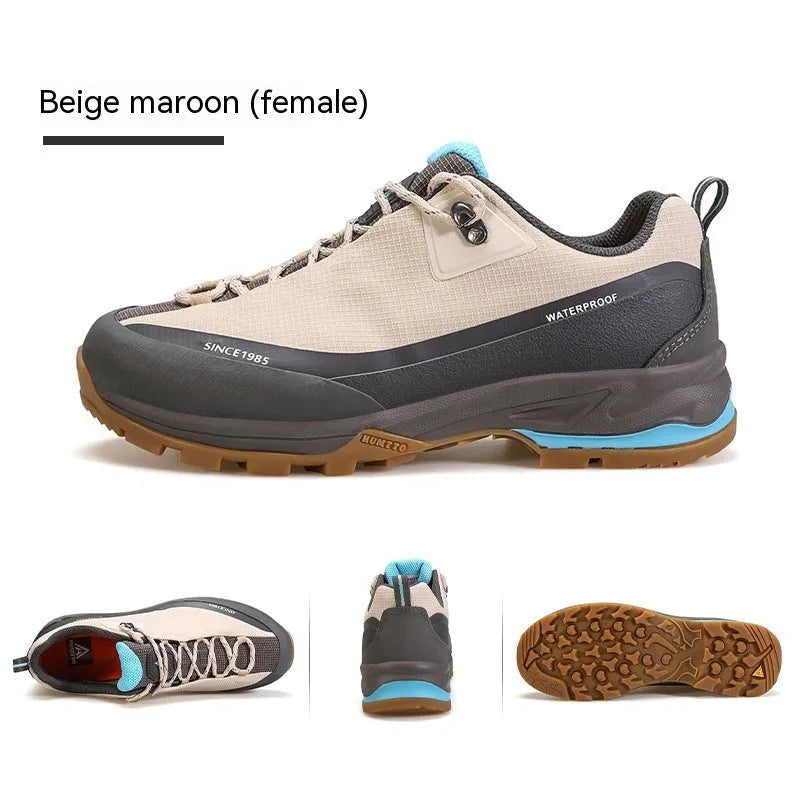 Men's low-top hiking boots in black with a leather mesh upper and rugged rubber outsole.