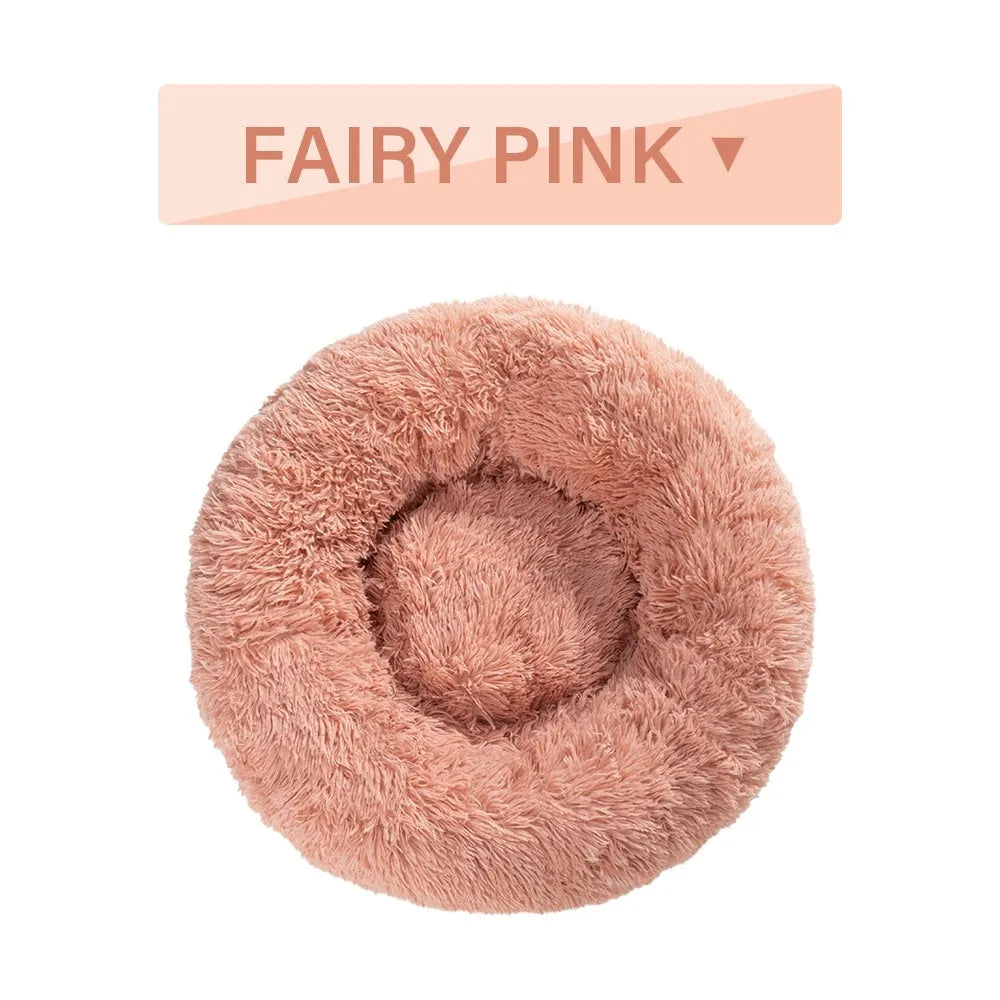Donut-shaped long plush pet bed with raised sides, shown in a neutral colour.