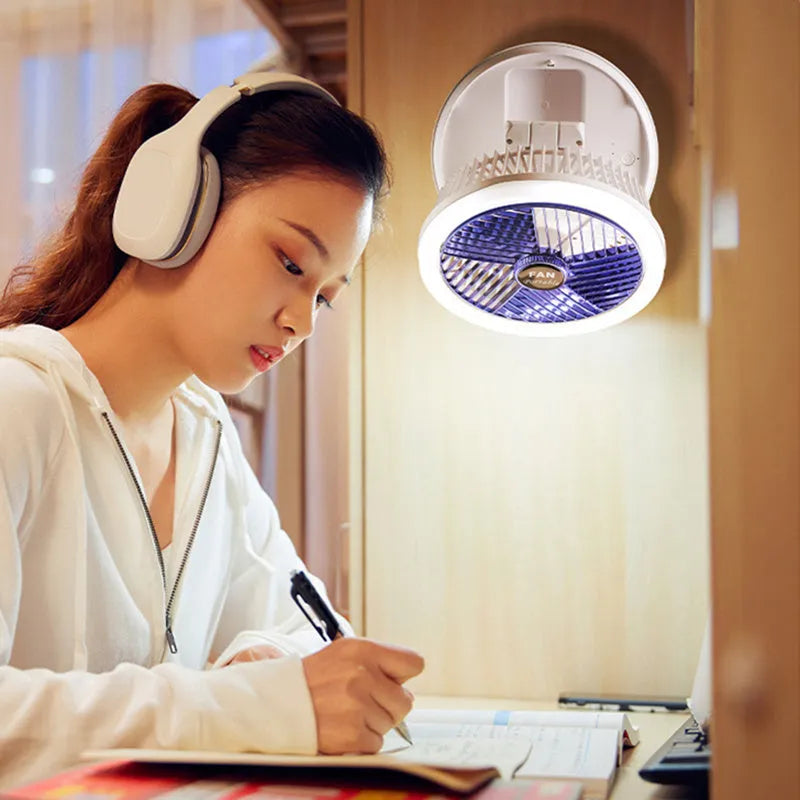 Blue foldable USB desk fan with LED light showing wall mount bracket and pen holder