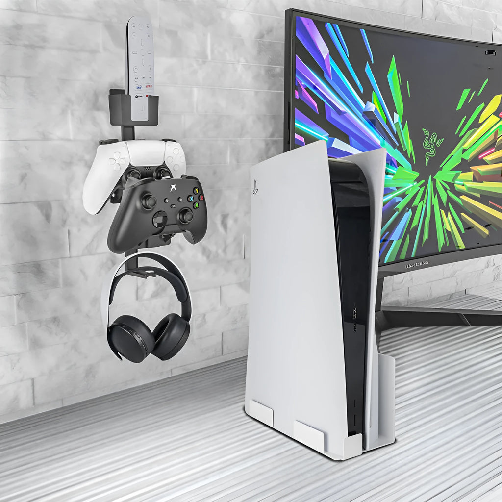 White wall-mounted hook holding PlayStation controller and headphones