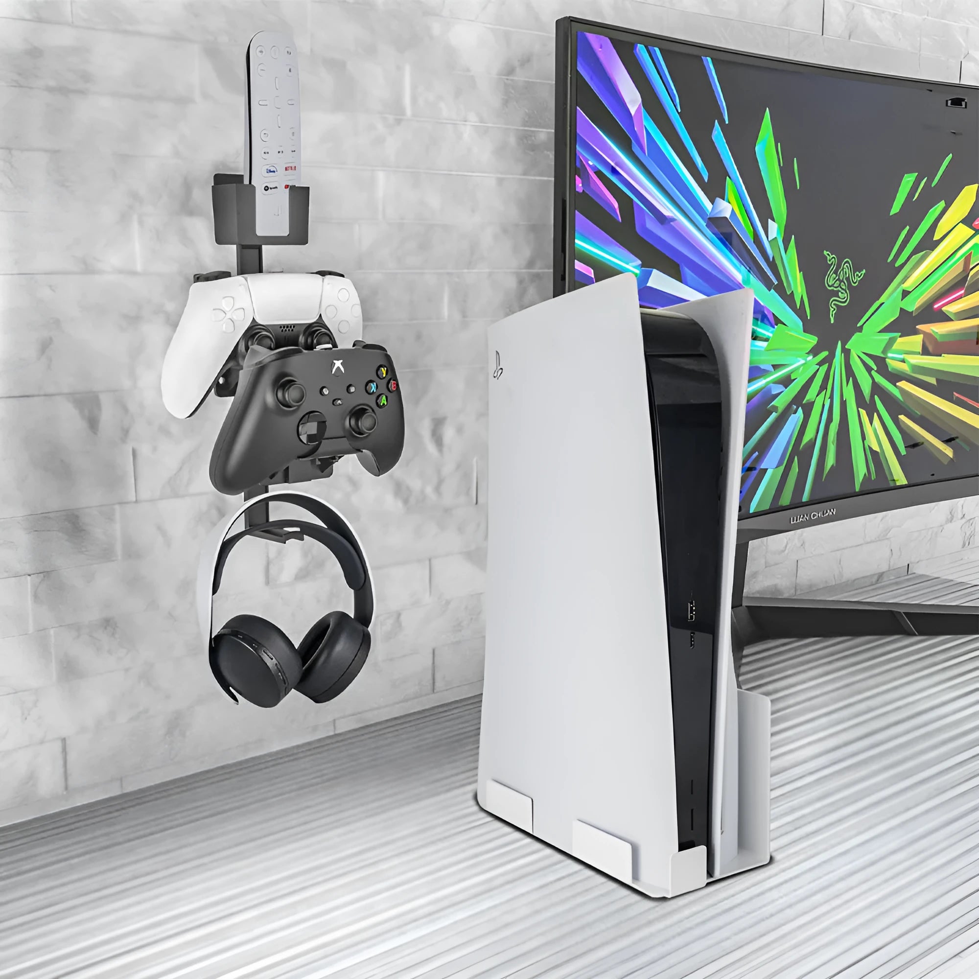 White wall-mounted hook holding PlayStation controller and headphones