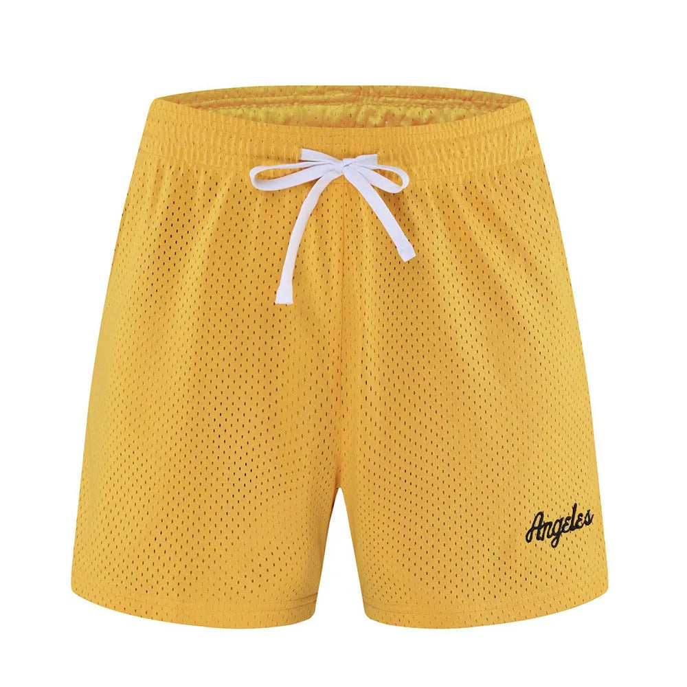 Men's double-layer mesh sports shorts in various colours on a size chart background.