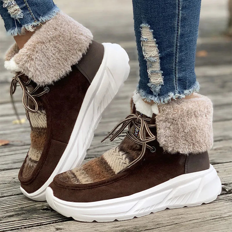 Women's lace-up snow boots with suede upper, plush lining, and platform sole