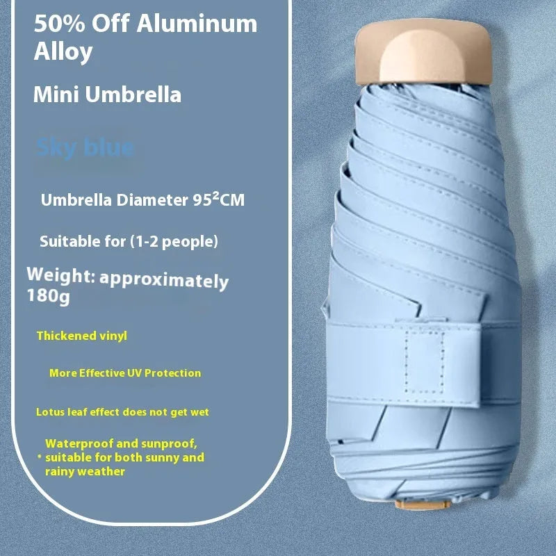 Five-fold manual umbrella with gradient vinyl sunshade showing six alloy bones in beige colour option