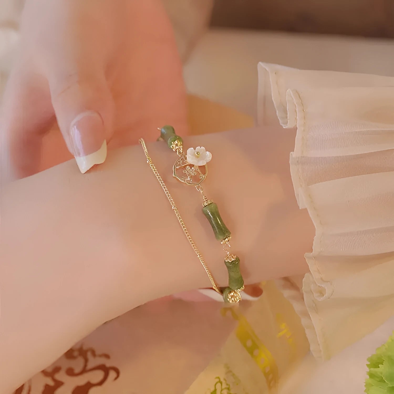 Natural olivine double layer bracelet with Bells of Ireland charms and olive branch detailing