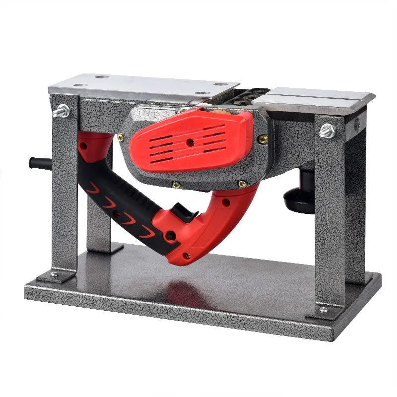 Red desktop electric wood planer with aluminium housing showing 82mm cutting width