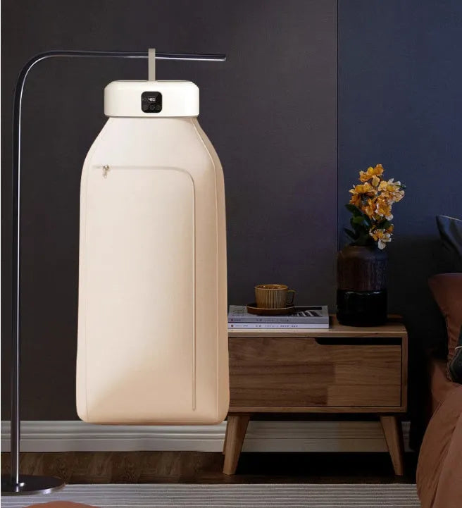White cylindrical remote control clothes dryer with compact foldable design