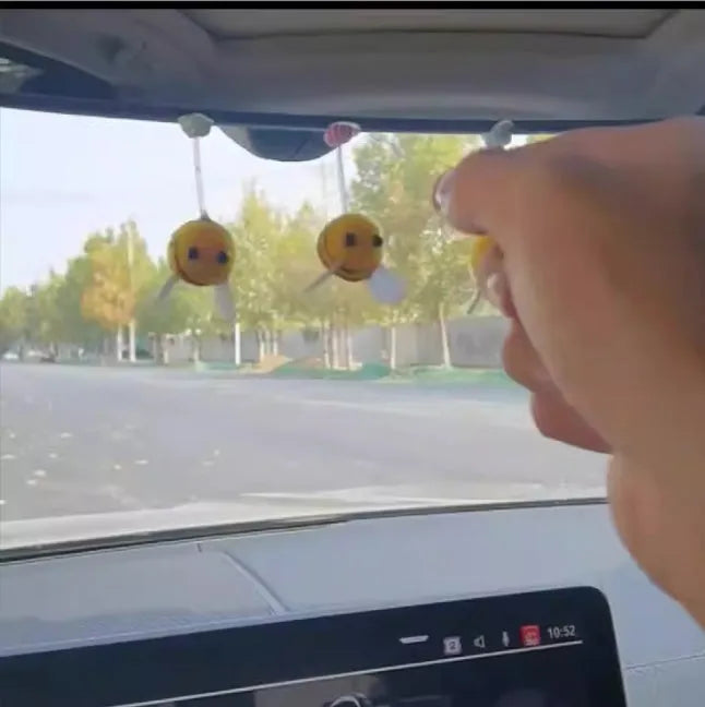 Yellow fur ball bee car decoration measuring 3cm square with cartoon design