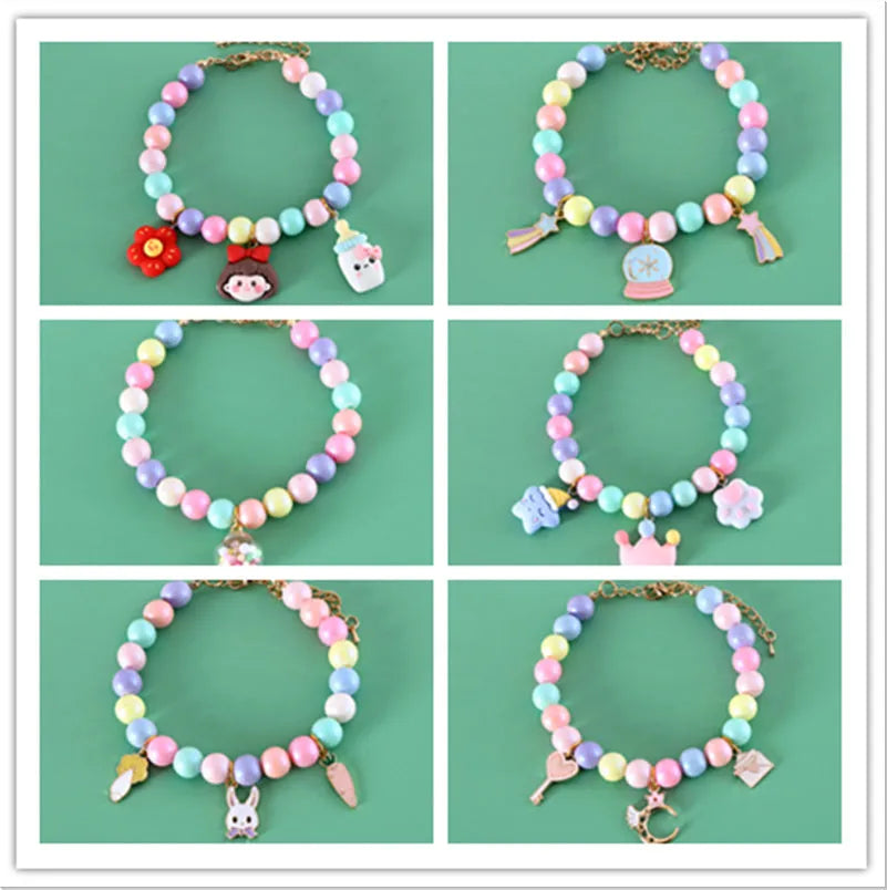 Macaron-colour pet collar with moon and pearl resin charms and a matching bracelet.