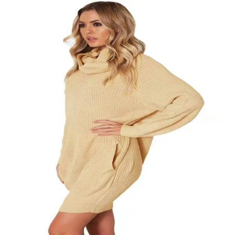 A mid-length apricot pullover sweater with a lapel neckline, loose fit, and side pockets on a hanger.