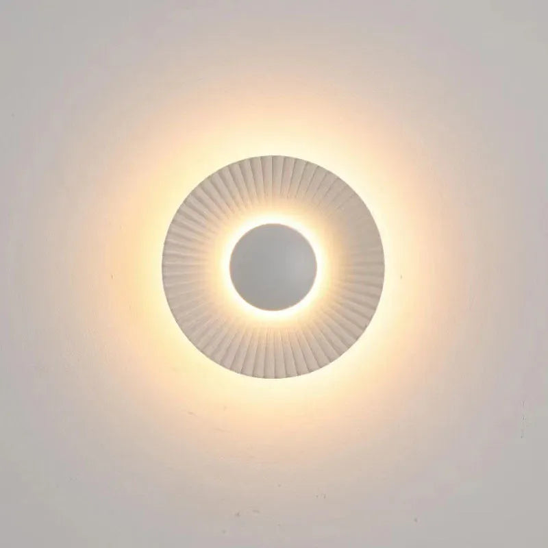 Round aluminium wall lamp with LED light source in multiple colour combinations for bedroom or living room