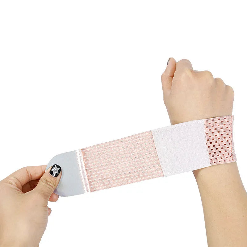 Athletic wristguard in pink black or gray showing high elastic breathable fabric for wrist support