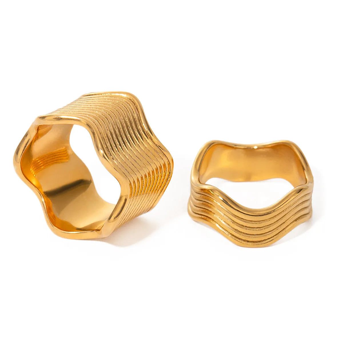 Stainless steel women's ring with geometric wide wave design and electroplated finish.