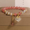 Women's natural crystal bracelet with strawberry quartz and white agate beads in auspicious clouds pattern